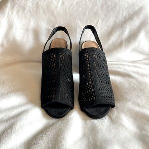 Black mesh designed heels with strap back